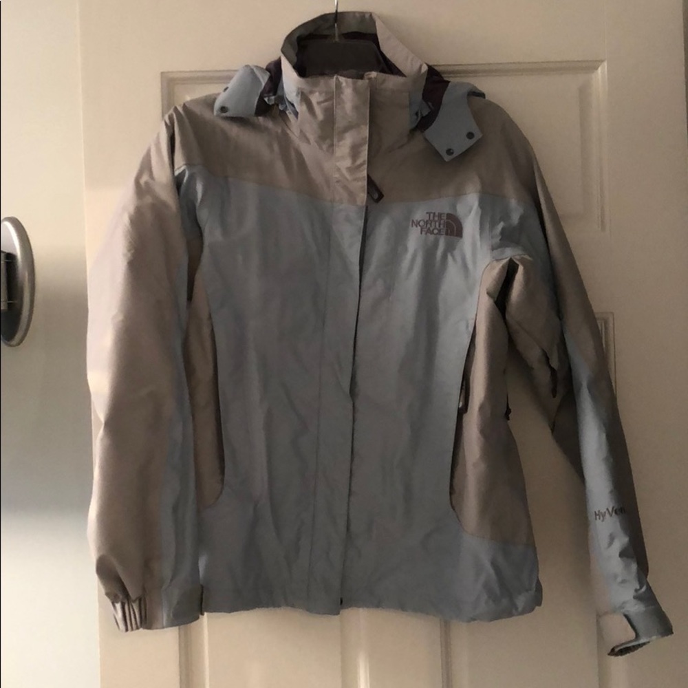Lt Blue and Gray North Face women’s hyVent jacket